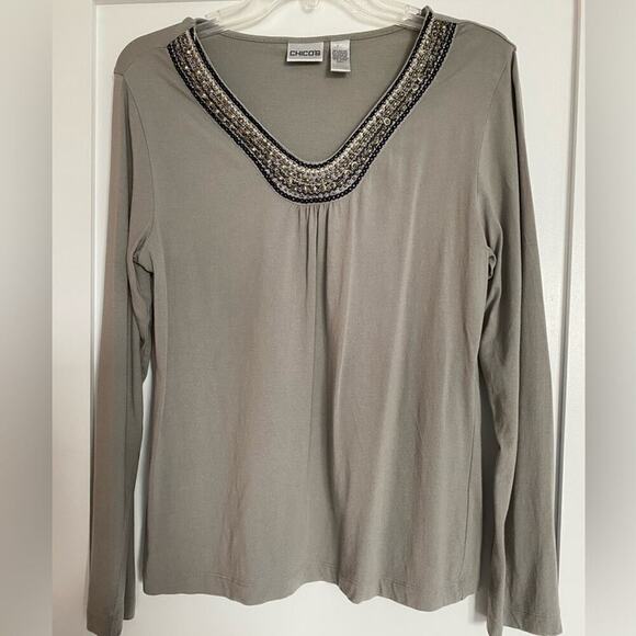 Chico’s griege tee shirt blouse top v neck sophisticated trim long sleeves Med
C - Picture 1 of 7